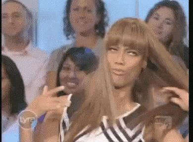 Woman Taking Selfie In Front Of Crowd GIF