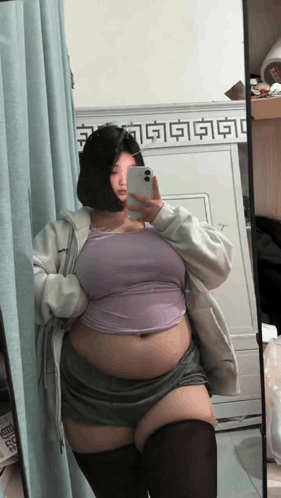 Woman Taking Selfie in Mirror