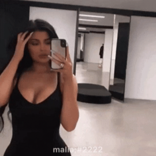 Woman Taking Selfie In Mirror GIF