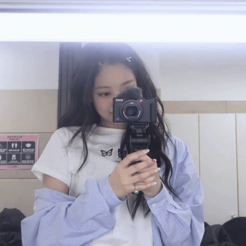 Woman Taking Selfie in Mirror