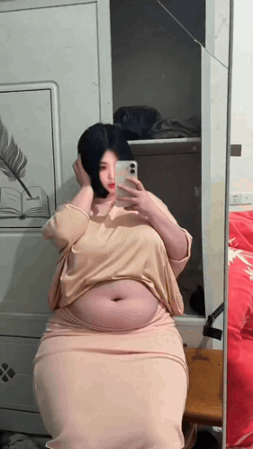 Woman Taking Selfie in Mirror