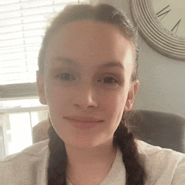 Woman Taking Selfie with Clock at 1 and 12