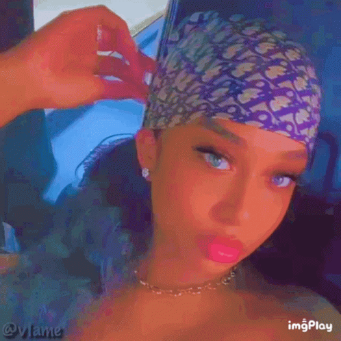 Woman Taking Selfie With Headband and Necklace