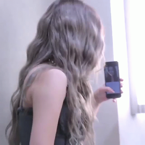 Woman Taking Selfie With Phone GIF