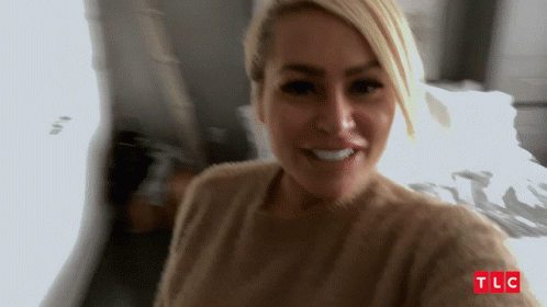 Woman Taking Selfie With TLC GIF