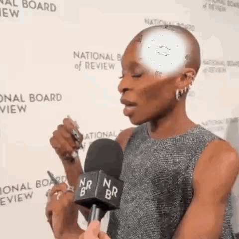 Woman Talking Into Microphone at National Board of Review