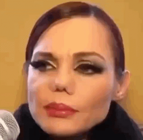 Woman Talking Into Microphone Close Up