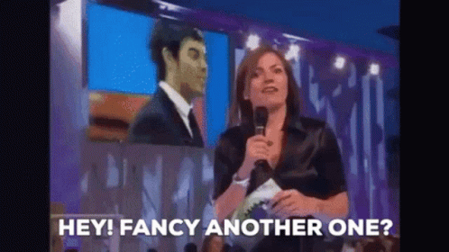 Woman Talking Into Microphone Hey Fancy Another One