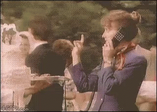 Woman Talking on Cell Phone and Thumbs Up