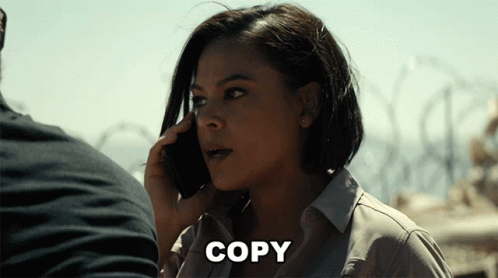 Woman Talking On Cell Phone Copy GIF
