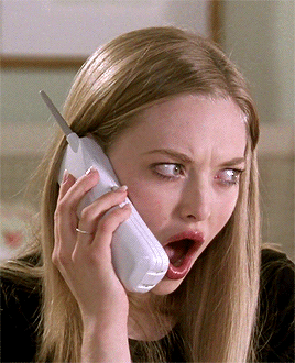 Woman Talking on Cell Phone Mouth Open