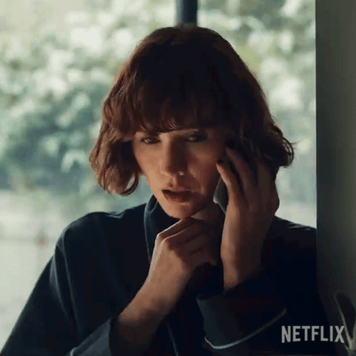 Woman Talking on Cell Phone Netflix Logo