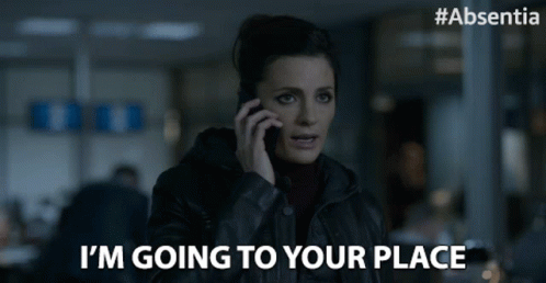 Woman Talking on Cell Phone Saying Going to Your Place