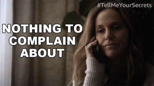 Woman Talking on Cell Phone Saying Nothing to Complain About