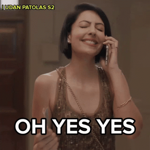 Woman Talking on Cell Phone Saying Oh Yes Yes