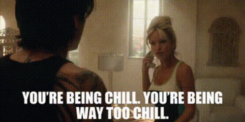Woman Talking On Cell Phone With Man Behind GIF