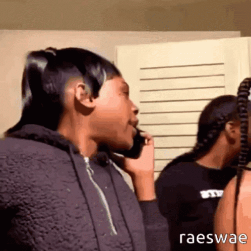 Woman Talking on Cell Phone With Raeswae