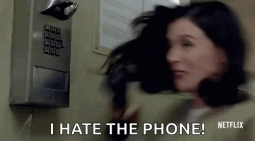 Woman Talking On Pay Phone Saying I Hate Phone GIF