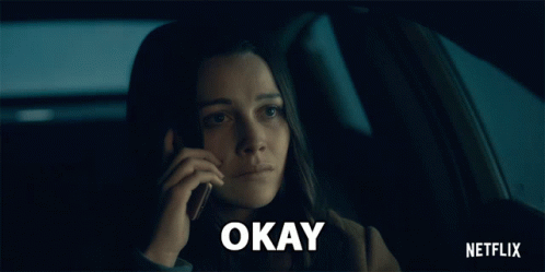 Woman Talking On Phone In Car Saying Okay GIF