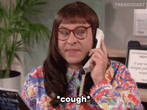 Woman Talking On Phone With Cough Above Head GIF