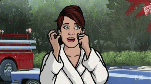 Woman Talking on Phone With Fire Truck in Background