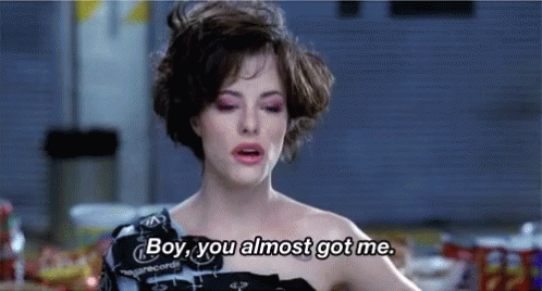 Woman Talking to Boy Wrapped in Duct Tape