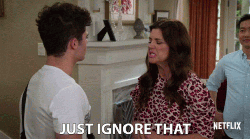 Woman Talking To Man Just Ignore That Netflix GIF