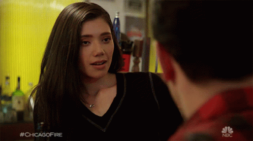 Woman Talking to Man With #chicagofire