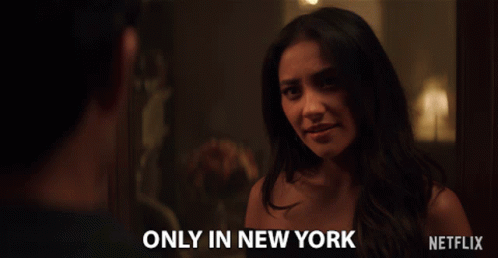 Woman Talking to Man with Only in New York