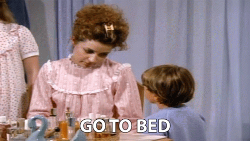 Woman Telling Child to Go to Bed