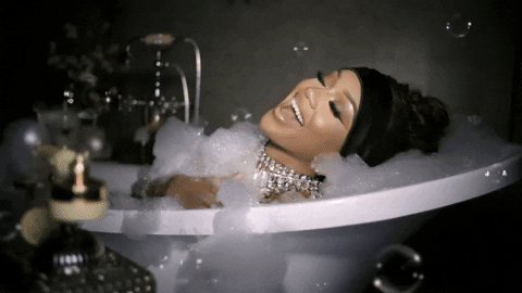 Woman Throws Bubbles From Bubble Bath GIF