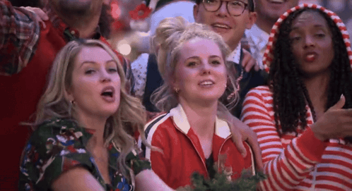 Woman Thumbs Up In Crowd GIF