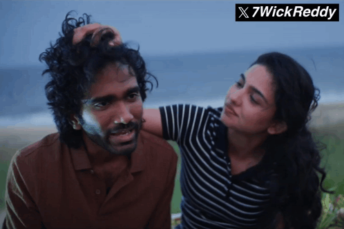 Woman Touching Man's Head with 7wickreddy Logo