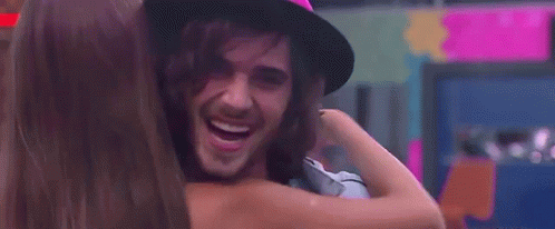 Woman Touching Man's Nose Smiling GIF