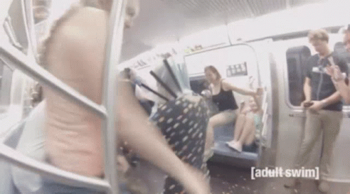 Woman Walking Down Train Stairs GIF