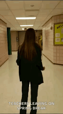 Woman Walking Hallway Teachers Leaving