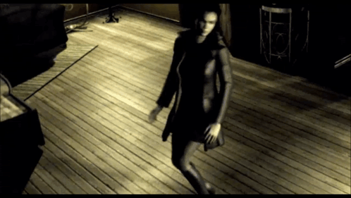 Woman Walking on Wood Floor