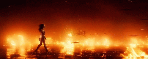 Woman Walking Through Burning Field