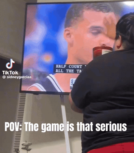 Woman Watching Half-Court Basketball Game On TV GIF