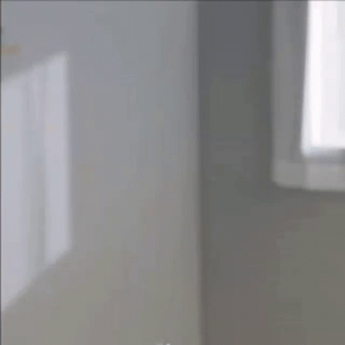 Woman Waving at Mirror