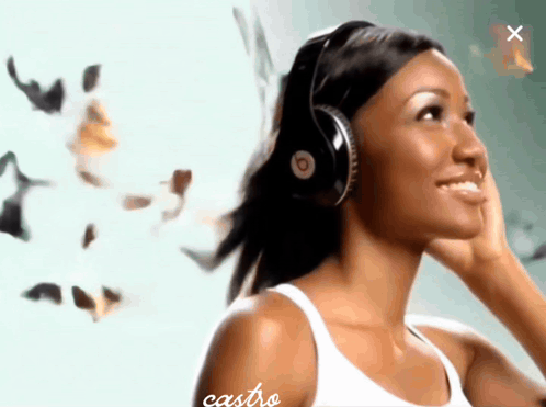 Woman Wearing Beats Headphones Smiling