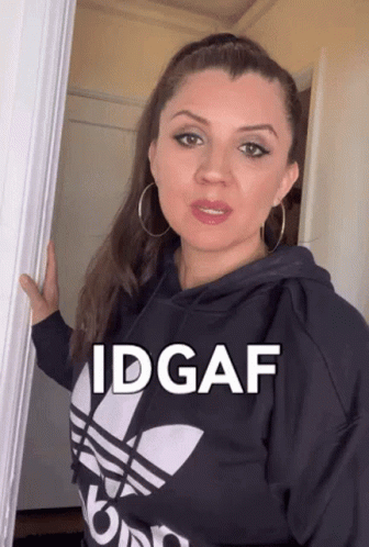 Woman Wearing Black Adidas Hoodie In Doorway