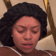 Woman Wearing Black Hat And White Bra GIF