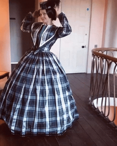 Woman Wearing Checkered Dress GIF