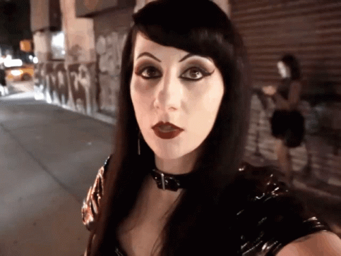 Woman Wearing Choker and Red Lipstick