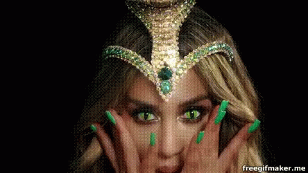 Woman Wearing Crown With Green Eyes