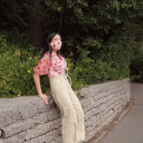 Woman Wearing Face Mask Leaning GIF