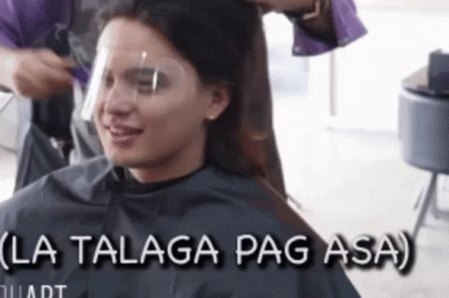 Woman Wearing Face Shield Getting Hair Cut GIF