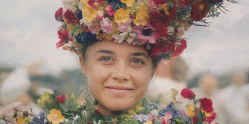 Woman Wearing Flower Wreath GIF