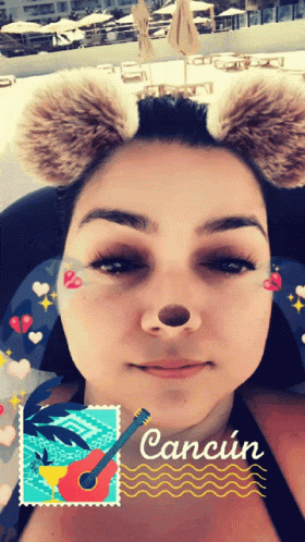 Woman Wearing Furry Ears And Cancun Stamp GIF